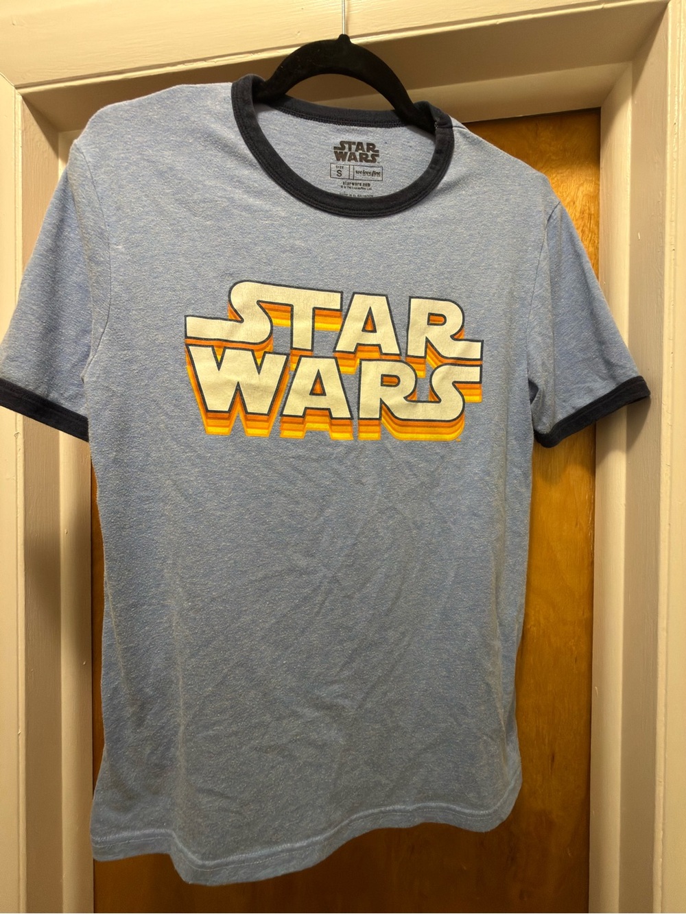 Star Wars Light Blue Ringer Tee with Navy Trim and Retro Orange-Yellow Logo